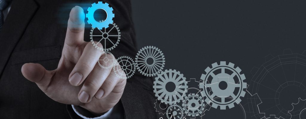 businessman hand draws gear to success concept